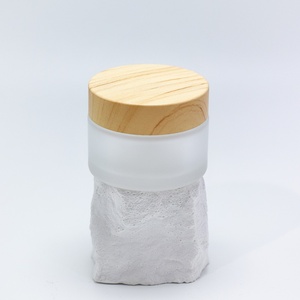 Custom Label Round <b>Glass</b> Jar 50g Cosmetic <b>Packaging</b> with Wooden Color Lid Frosted <b>Glass</b> Cosmetic Cream Jar - Product Image 2
