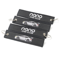 Porte-clés en tissu tissé personnalisé avec logo, bord surjeté, vente en gros, pour promotion et cadeaux