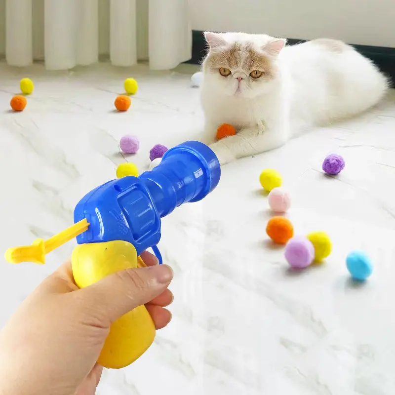 Haustierzubehör Training Katze Teaser Kratzball Kätzchen Pompoms Spiele Katze Plüschleise Klopfball-Waffe Spielzeugpistole