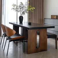 Ensemble de salle à manger minimaliste italien de luxe léger, table et chaises de salle à manger modernes en dalle de roche et cadre en bois massif pour la maison/l'hôtel