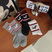 Chaussettes rayées personnalisées en coton avec motif de chien de dessin animé, mi-mollet, classiques pour hommes et femmes, noir, blanc, gris, chaussettes personnalisées tissées et tricotées