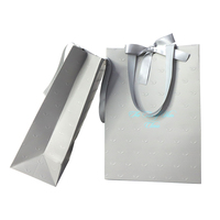 Emballage en papier kraft imprimé avec logo personnalisé, sac cadeau gaufré pour bijoux, cosmétiques, maquillage
