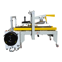 Machine d'emballage automatique pneumatique pour boîtes en carton avec ruban de cerclage pour l'emballage alimentaire et textile