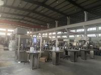 Ligne de production entièrement automatique pneumatique pour le remplissage, le bouchage et l'étiquetage de boissons gazeuses avec moteur
