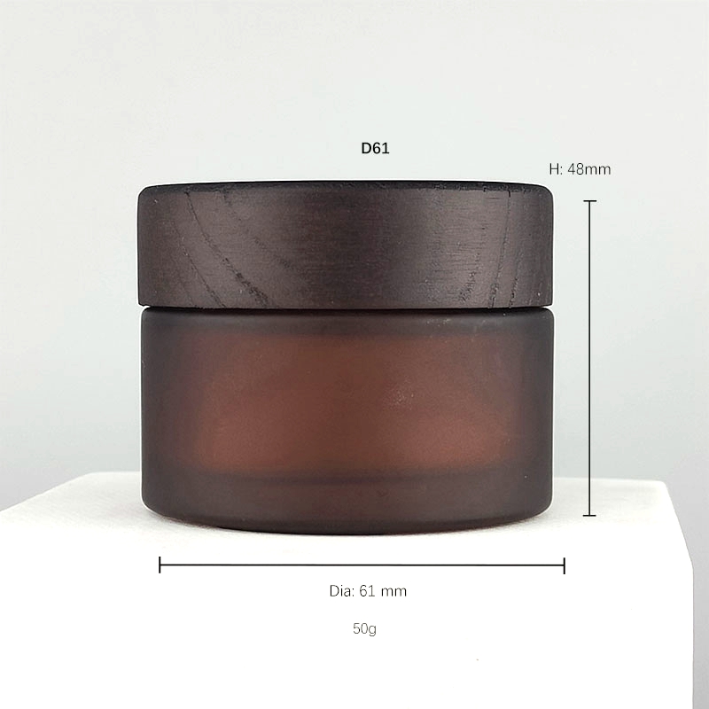 frosted amber glass jar with dark color lid