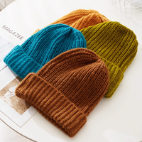 Vente en gros Bonnets d'hiver pour femme de créateur unisexe Logo personnalisé Chapeaux d'hiver acrylique pour femme Chapeaux chauds unisexes en tricot Casquettes