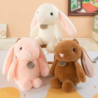 Peluches lapins à longues oreilles Kawaii en coton, jouets en gros pour machines à griffes d'arcade et designs personnalisés