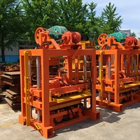 Machine de moulage semi-automatique SHUNYA pour blocs de pavé creux en béton, machine à fabriquer des briques QTJ4-40 avec surveillance à distance