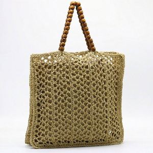 Bolso de playa de malla de ganchillo hueco para mujer, novedad de verano 2025, con asa de cuentas de madera - Product Image 3