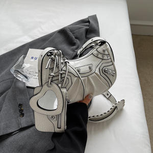 Bolso cruzado de cuero PU de Venta caliente Ins diseñador de moda marcas <span class=keywords><strong>famosas</strong></span> monederos y bolso retro remache locomotora bolsa - Product Image 6