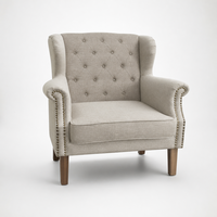 Fauteuil à dossier haut capitonné en lin 100% avec pieds en chêne massif et garniture cloutée, chaise de lecture pour salon, mobilier sur mesure