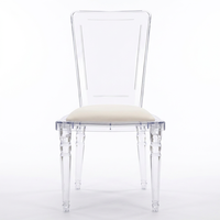 Chaise Ghost empilable en polycarbonate avec assise en velours rembourrée et structure démontable pour banquets et cafés modernes