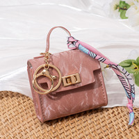 Dompet Koin Bulat Merah Modis Kulit PU Tas Mini Kecil Tempat Koin Gantungan Kunci Desainer Mewah Ramah Lingkungan Liontin Berkualitas Tinggi