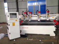 Routeur CNC multi-têtes 1325 robuste de conception spéciale pour la fabrication de meubles avec pompe à engrenages NC Studio PLC pour la découpe du bois