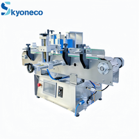 Machine d'étiquetage à jet d'encre haute précision pour la date de production, adaptée à tous les types de bouteilles rondes pour les usines de boissons et de cosmétiques