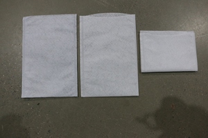 Ligne de production de gants rectangulaires jetables non tissés entièrement automatique, entraînée par un moteur PLC, marque ALT, 100-200 pièces/min - Product Image 6