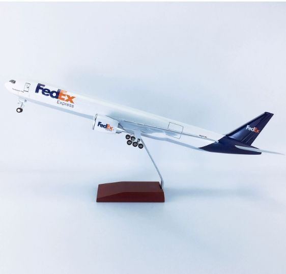 white- FedEx B777-300er with wheels