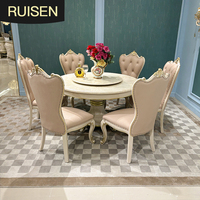 Table et chaises de salle à manger en marbre massif de style palais européen, idéales pour les villas de luxe.