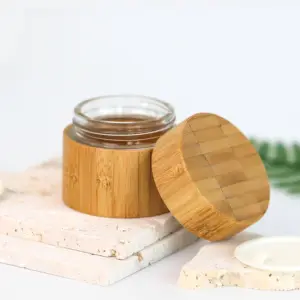 En stock ensemble rond de récipient de pot de crème cosmétique en bois de bambou de luxe emballage pot de crème en bambou vide avec intérieur en PP