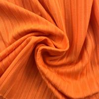 Tissu en tricot côtelé extensible en polyester pour vestes d'automne/printemps pour femmes manches courtes et robes.