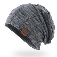 Venta al por mayor de acrílico a cuadros Jacquard de punto aislado Slouchy Knit Oversized Long Winter Slouch Rasta Hat Reggae Cap Beanie para mujeres