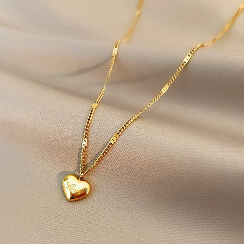 Collana in acciaio inossidabile con cuore d'amore placcato oro 18 carati catena clavicola popolare semplice gioielli con ciondolo a cuore classico