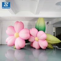 Modèle de fleur gonflable géante rose personnalisée pour la décoration de sites touristiques extérieurs, de scènes, de marchés et de festivals