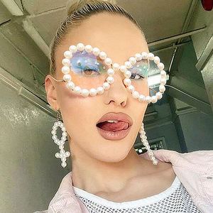 แว่นกันแดดทรงแคทอายโอเวอร์ไซส์ขาแว่นลายคลื่นแฟชั่นวินเทจปี 2020 ขายส่ง พร้อมกรอบแว่นมุกสีรุ้งสำหรับผู้หญิง - Product Image 1