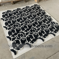 Tuile de motif de pierre de mosaïque de mur de conception de jet d'eau noir de forme de coquille