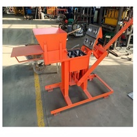 Nouvelle machine de fabrication de briques de terre pour le sol imbriqué et les briques de ciment pour les usines de fabrication Machine à blocs de pavage