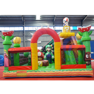 Aire de jeux gonflable sur le thème des jeux de dessins animés avec toboggan et zone de saut pour les enfants, idéale pour les fêtes estivales en plein air et les parcs d'attractions. - Product Image 3