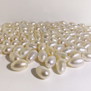 Perlas blancas de agua dulce naturales de fábrica, botón redondo semiperforado de 0,8mm y cuentas sueltas en forma de arroz para la fabricación de joyas - Product Image 5