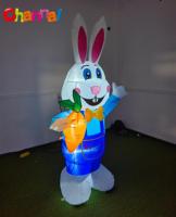 Décor gonflable de lapin de Pâques avec des carottes pour le printemps, la pelouse extérieure et le jardin