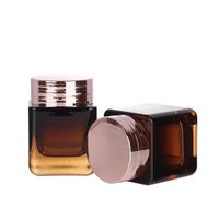 Anpassbares 50g quadratisches cremefarbenes Glas mit silbernem Schraub verschluss Leerer bernstein farbener Kosmetik behälter mit Deckel für die Verpackung von Gesichts produkten