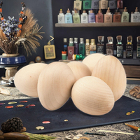 Œuf en bois poli sûr pour enfants, décoration colorée d'art populaire pour la Journée de la Terre, utilisation sur table NOORBABA INTERNATIONAL NOORBABA7666