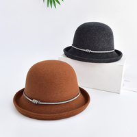 Venta al por mayor de fábrica Formal enrollable ala Cloche sombrero tendencia de moda Fedora sombreros con decoraciones liso superior sombrero de invierno para las mujeres
