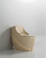WC monobloc moderne et écologique à poser au sol avec évacuation en S, design facile à nettoyer, finition or-gris pour hôtels