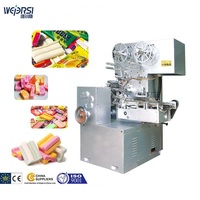 Machine d'emballage de bâtonnets de bonbons en 5 parties
