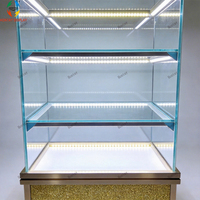 Vitrine en verre trempé avec éclairage LED personnalisé et base illuminée pour boutique de bijoux et centre commercial