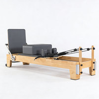 Appareil de Pilates professionnel commercial en bois de chêne pour studio, machine d'entraînement de base avec dispositif à ressort allemand, durable