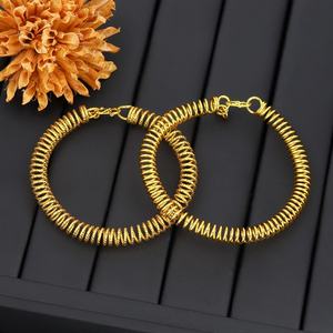 Jxx New Design 24K Gold Plated Open Cuff Bangle Trendy <b>Charm</b> <b>Bracelets</b> with Spring Wire Brass Spring Bangle Unisex - Product Image 1
