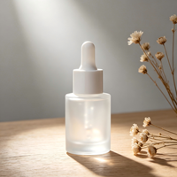 Flacon d'essence liquide de 30 ml, flacon cylindrique à épaule plate, flacon liquide en verre de 20 ml, huiles essentielles emballées, flacons vides.