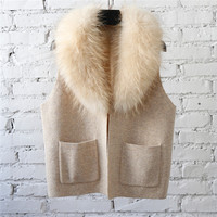 Gilet en laine tricotée bleu marine sans manches avec col en fourrure de raton laveur, nouveau design printemps-automne, vente en gros Tyan, gilet en pure laine personnalisé pour femme