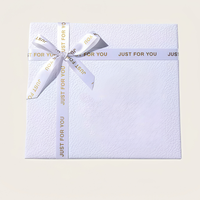 Boîte de papier orange de luxe conception de ruban matériaux recyclés boîte-cadeau de Noël décorative vide pour l'emballage de vêtements gaufrage