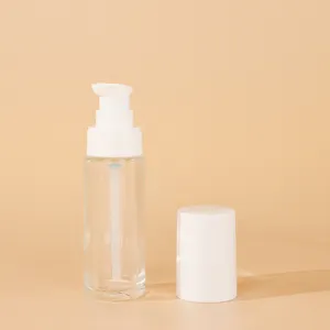 定制30毫升1盎司圆形透明粉底泵头化妆品瓶，用于带定制盒的粉底