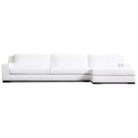 Canapé d'angle moderne et élégant pour appartement, avec coussins doux et confortables, idéal pour salon.