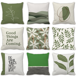 Custom-made modern green Instagram-style <b>throw</b> pillows with floral abstract designs. - Product Image 1