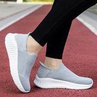 Chaussures de marche pour femmes en maille tricotée, à enfiler, avec col élastique, bout large, plateforme ondulée, antidérapantes, pour usage quotidien et décontracté, OEM ODM Vente en gros