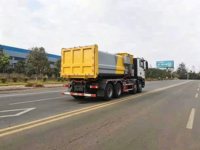 Camion benne à benne basculante arrière SITRAK G5 8X4 Diesel Manuel Grande Capacité avec Conteneur Amovible pour Déchets Urbains