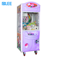 Machine de jeu de pêche aux peluches à succès avec un prix en forme de peluche, garantie 1 an, support anglais/espagnol, compatible 110V/220V